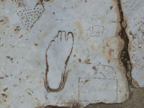 (Apg 19:6) Along "Marble Street" is what is believed to be the world's oldest known advertising sign. It showed the way to a brothel located opposite the city's large library. Engraved in the paving stone is a heart, a left foot, and a scantily clad woman. The left foot indicates that the brothel was on the left side.